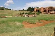 9th Green at Lost City with the iconic clubhouse behind