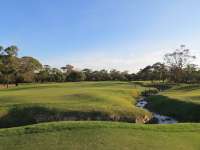 Approaching the 1st Green