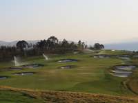 The heavily bunkered par five 18th